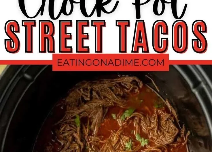 Crock Pot street tacos served on a plate with toppings.