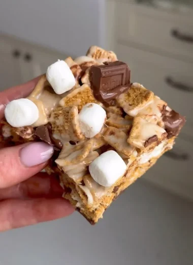 Delicious Golden Grahams S'mores Bars stacked on a plate