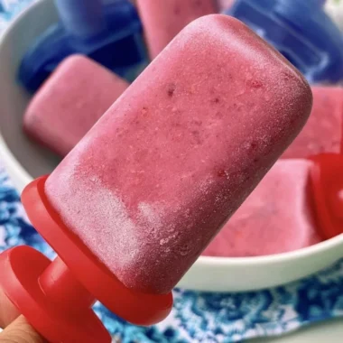 Homemade Berry Coconut Popsicles with fresh berries and coconut milk