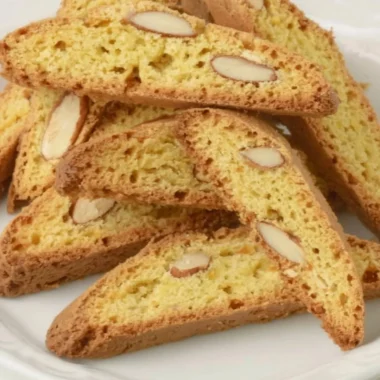 A plate of crunchy Cantucci Cookies, perfect for enjoying with coffee.