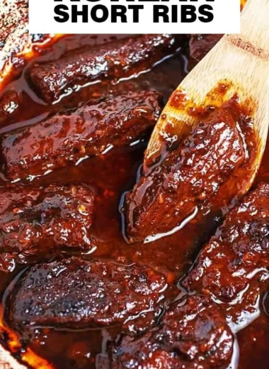 Korean braised short ribs served with sides in a rustic dish