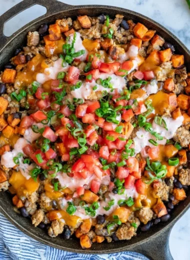 Turkey Sweet Potato Skillet with colorful vegetables in a frying pan