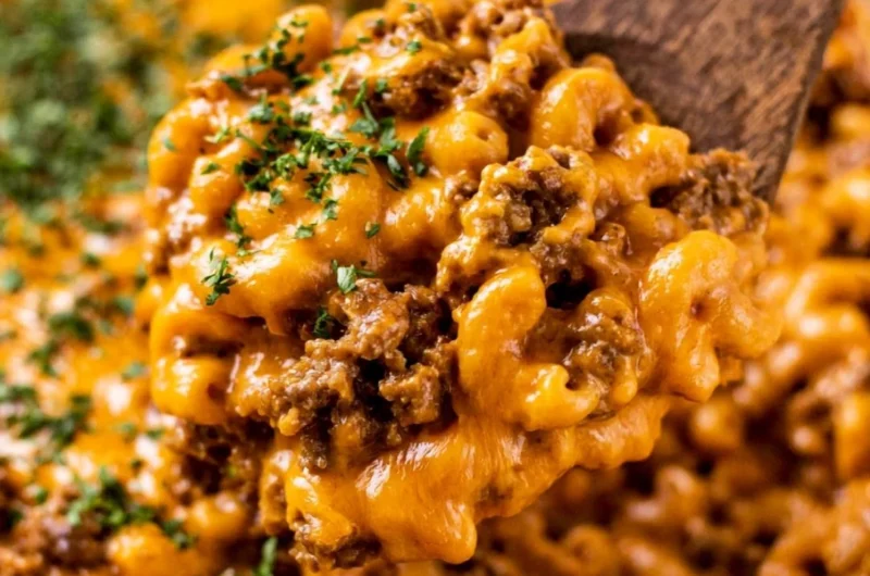 Delicious cheeseburger casserole topped with cheese and herbs