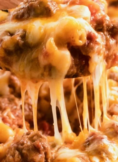 Cheeseburger casserole with beef, cheese, and pasta in a baking dish