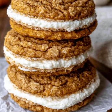 Cozy pumpkin oatmeal cream pies with creamy filling, perfect for fall desserts.