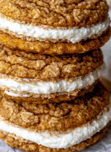 Cozy pumpkin oatmeal cream pies with creamy filling, perfect for fall desserts.