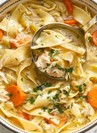 Bowl of easy chicken noodle soup with vegetables and noodles.