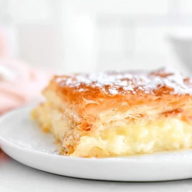 Traditional Greek Bougatsa pastry with sweet filling and flaky texture