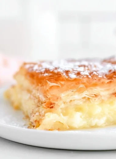Traditional Greek Bougatsa pastry with sweet filling and flaky texture