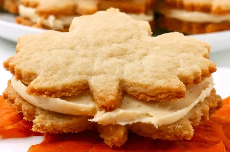 Delicious homemade Maple Cream Cookies stacked on a plate