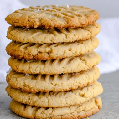 Soft and chewy peanut butter cookies on a plate, fresh from the oven.