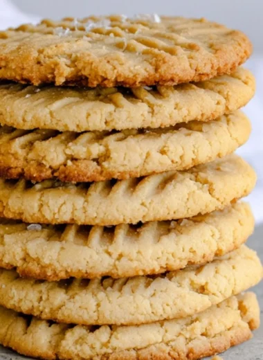 Soft and chewy peanut butter cookies on a plate, fresh from the oven.