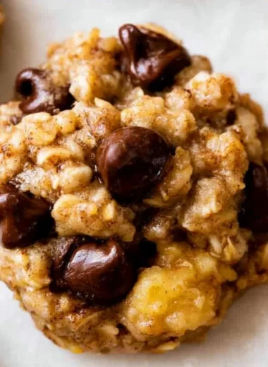 Cozy banana oatmeal cookies stacked on a plate, ready to enjoy.