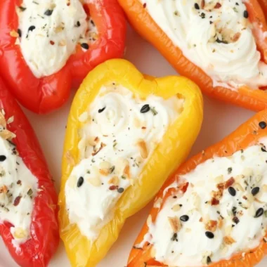 Everything bagel cream cheese stuffed peppers served on a plate